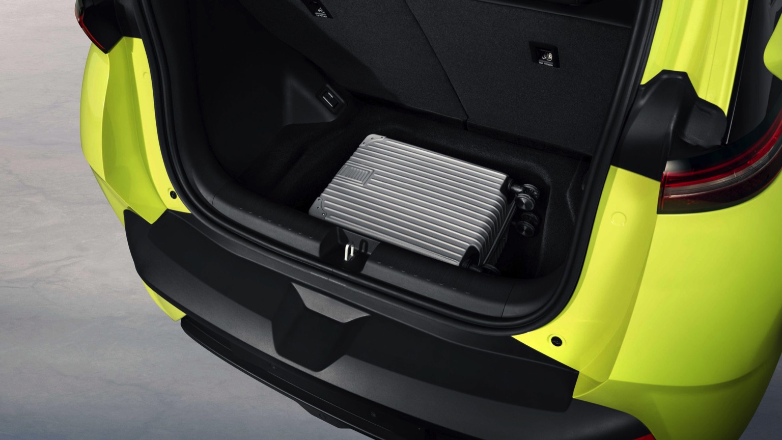 BYD Dolphin surf in yellow boot close up