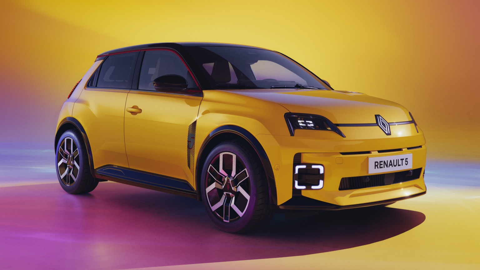 Renault 5 etech yellow EV front view
