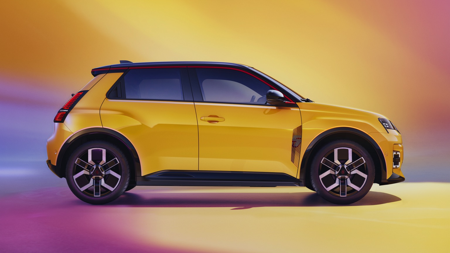 Renault 5 etech yellow EV  rear