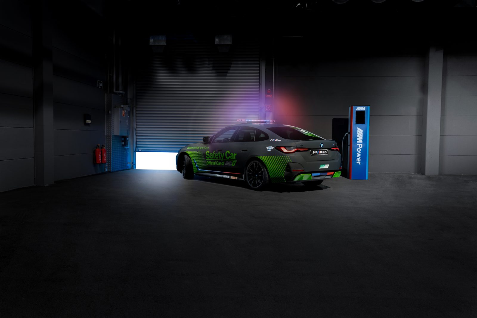 BMW i4 moto e electric car in garage