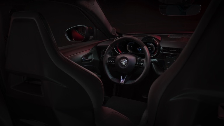 Alfa Romeo Junior Elettrica electric car interior - steering wheel and dashboard
