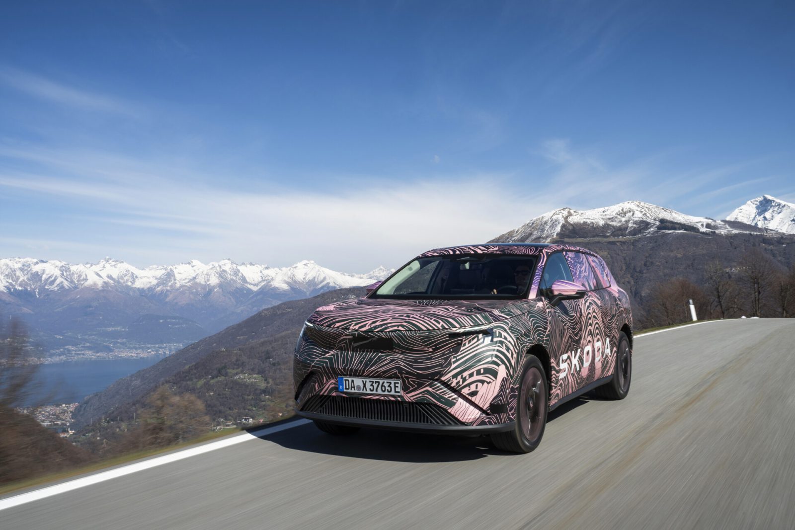 Skoda Peaq electric SUV camouflaged, side profile driving shot