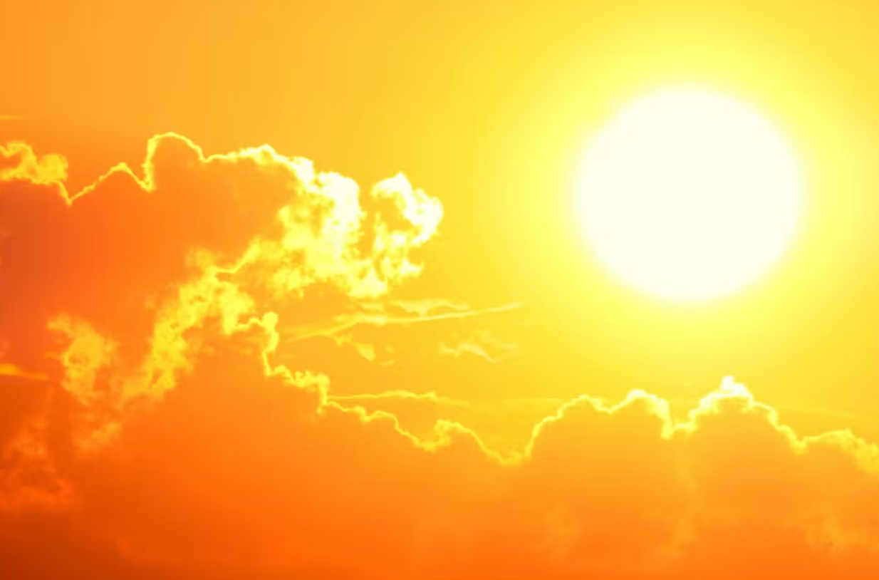 the sun, orange sky and clouds