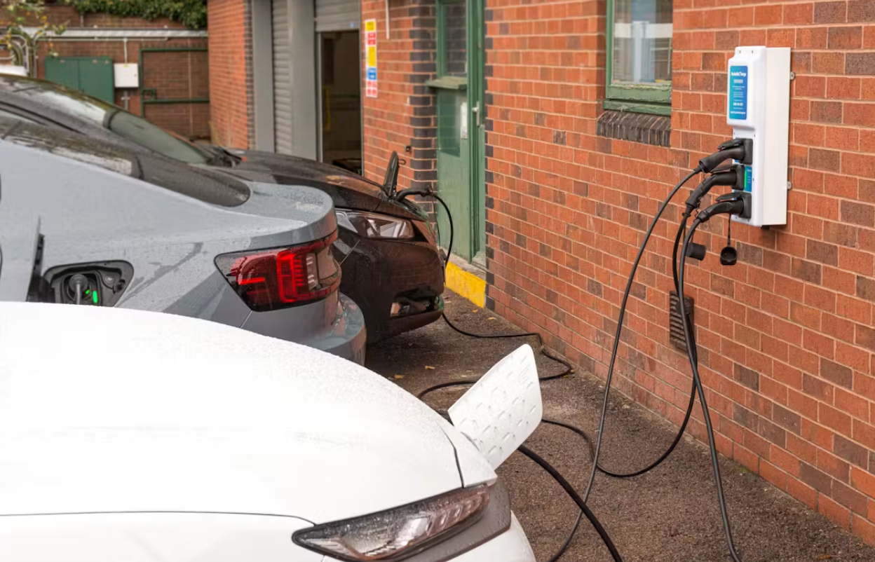 3 electric cars charging at workplace
